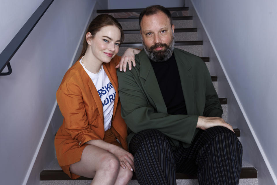 Emma Stone, left, and director Yorgos Lanthimos pose for a portrait photograph for the film 'Kinds of Kindness' at the 77th international film festival, Cannes, southern France, Saturday, May 18 2024. (Photo by Vianney Le Caer/Invision/AP)