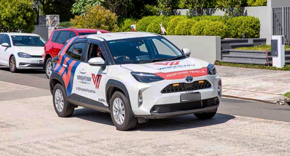 A Wrightman Security Services car is seen patrolling the streets of Mosman.