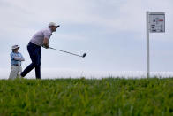 Rory McIlroy, of Northern Ireland, watches his shot from the 14th tee during a practice round of the U.S. Open Golf Championship, Wednesday, June 16, 2021, at Torrey Pines Golf Course in San Diego. (AP Photo/Marcio Jose Sanchez)