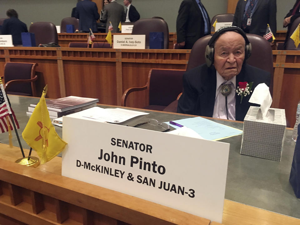 FILE- This Jan. 16, 2018, file photo New Mexico Sen. John Pinto, D-Gallup, one of the longest serving Native American lawmakers in the nation's history, sits as the New Mexico Legislative session began, Tuesday, Jan. 16, 2018, in Santa Fe, N.M. (AP Photo/Russell Contreras, File)