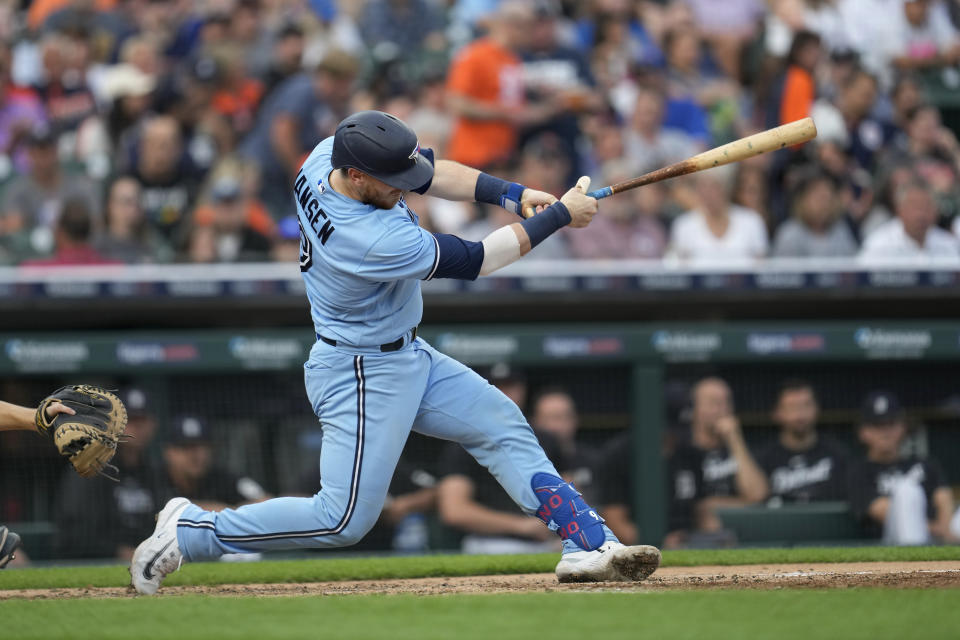 Toronto Blue Jays' Danny Jansen hits a two-run single against the Detroit Tigers in the fourth inning of a baseball game, Friday, July 7, 2023, in Detroit. (AP Photo/Paul Sancya)