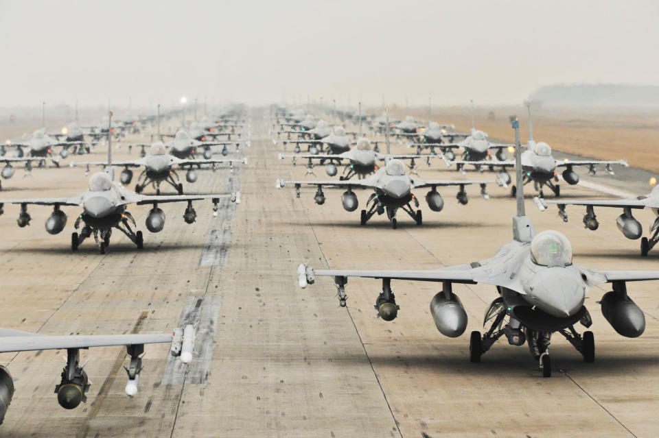 Various aircrafts demonstrate an "Elephant Walk" as they taxi down a runway during an exercise at Kunsan Air Base, South Korea. The exercise showcased the aircrews' capability to quickly and safely prepare an aircraft for a wartime mission (Brittany Y. Auld/USAF/Rex Features)