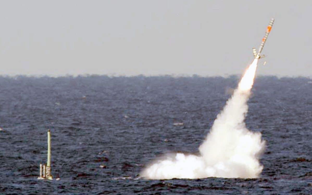 A Tomahawk cruise missile launches from a nuclear powered submarine at sea. A Tomahawk can strike targets on land up to a thousand miles from the sub, and nuclear submarines mean that such an attack can come from anywhere there is deep enough water