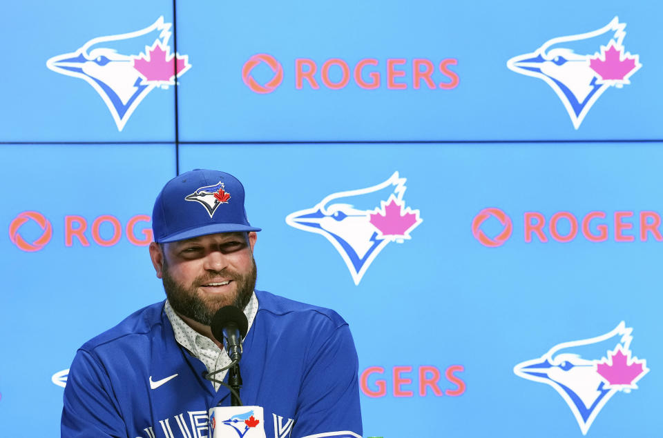 Toronto Blue Jays manager John Schneider speaks during a press conference in Toronto on Friday, Oct. 21, 2022. The Toronto Blue Jays and manager John Schneider have agreed to terms on a three-year contract with a team option for the 2026 season, the club announced Friday. (Nathan Denette/The Canadian Press via AP)