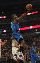 CHICAGO, IL - APRIL 21: Rodrigue Beaubois #3 of the Dallas Mavericks lays in a shot past Loul Deng #9 of the Chicago Bulls at the United Center on April 21, 2012 in Chicago, Illinois. NOTE TO USER: User expressly acknowledges and agress that, by downloading and/or using this photograph, User is consenting to the terms and conditions of the Getty Images License Agreement. (Photo by Jonathan Daniel/Getty Images)