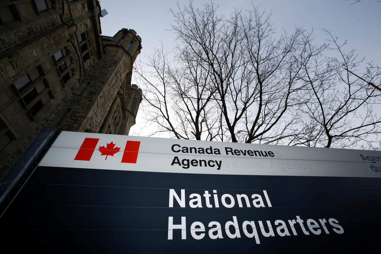 A sign is pictured in front of the Canada Revenue Agency (CRA) national headquarters in Ottawa, Ontario, Canada March 13, 2017. REUTERS/Chris Wattie