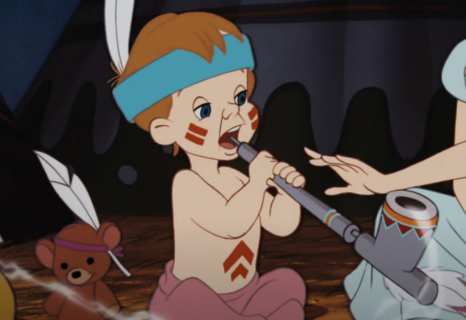 cartoon toddler in traditional native american headress