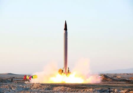 A new Iranian precision-guided ballistic missile is launched as it is tested at an undisclosed location October 11, 2015. REUTERS/farsnews.com/Handout via Reuters