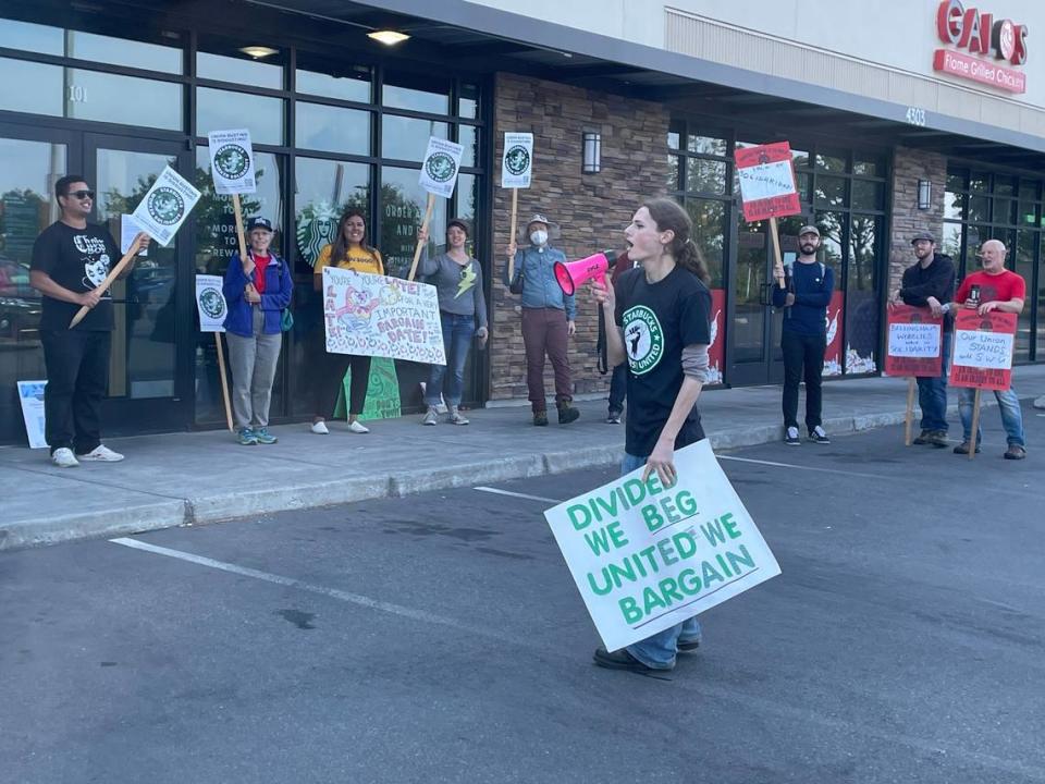 Starbucks workers stage a one-day walkout of the Bellingham store on Meridian Street Friday, Aug. 12. Workers recently formed a union at the store and are seeking a contract with the company.