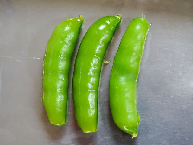 Daniel Gritzer While the differences were incredibly subtle, the beans cooked in unsalted water (center) were the crispest and most vibrant, but the beans cooked in the heavily salted water (left) had better flavor; beans cooked at 185°F weren't quite as vibrant, but not radically so.