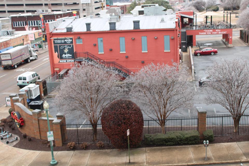 Downtown Memphis and Beale Street took on an icy and empty look on Jan. 31, 2023, after a winter storm coated trees and roofs with ice and dropped temperatures into the 20s.