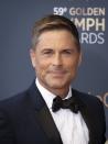 <p>Rob Lowe's career was revived after joining <em>The West Wing</em> as Sam Seaborn in 1999. But he left the political drama in 2002, reportedly over a pay dispute. The actor made a statement at the time, thanking producers for allowing him to leave the show gracefully. "We were a part of television history and I will never forget it," he said <a href="https://abcnews.go.com/Entertainment/story?id=101202&page=1" rel="nofollow noopener" target="_blank" data-ylk="slk:in the statement;elm:context_link;itc:0" class="link ">in the statement</a>. </p>