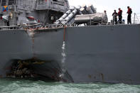 <p>The U.S. Navy guided-missile destroyer USS John S. McCain is seen after a collision, in Singapore waters Aug. 21, 2017. (Photo: Ahmad Masood/Reuters) </p>