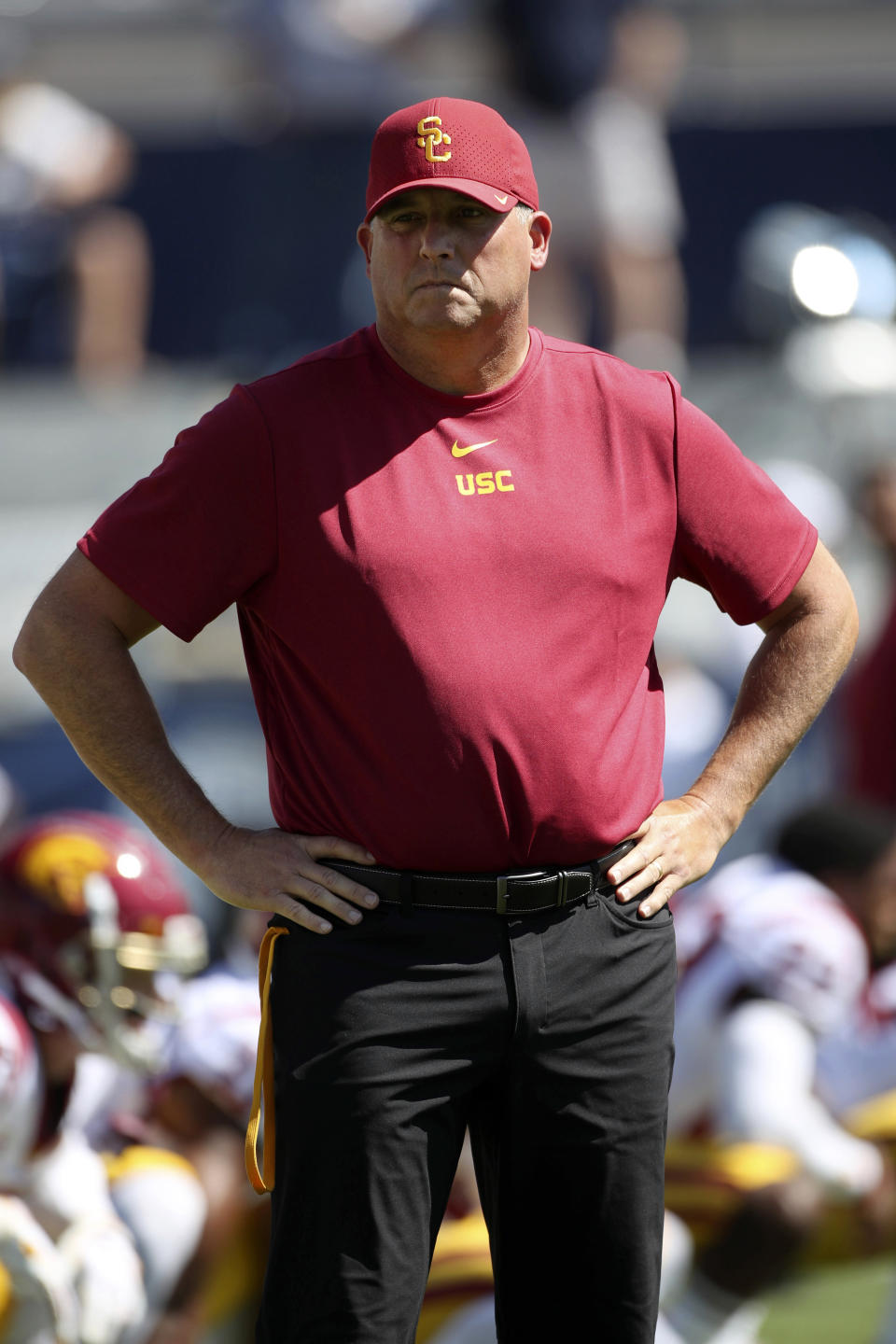 Southern California head coach Clay Helton watches his players warm up before a NCAA college football game against BYU, Saturday, Sept. 14, 2019, in Provo, Utah. (AP Photo/George Frey)