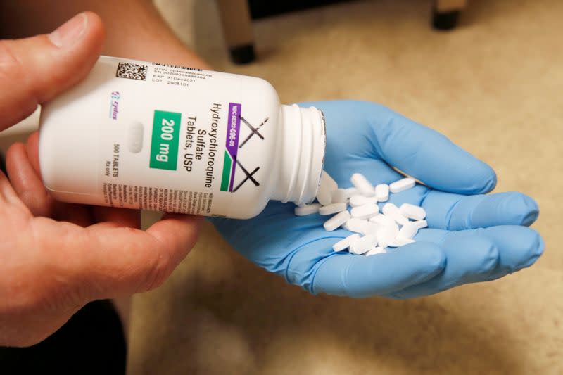 FILE PHOTO: The drug hydroxychloroquine, pushed by U.S. President Donald Trump and others in recent months as a possible treatment to people infected with the coronavirus disease (COVID-19), is displayed by a pharmacist in Provo