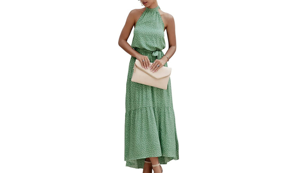 woman wearing a green halter dress