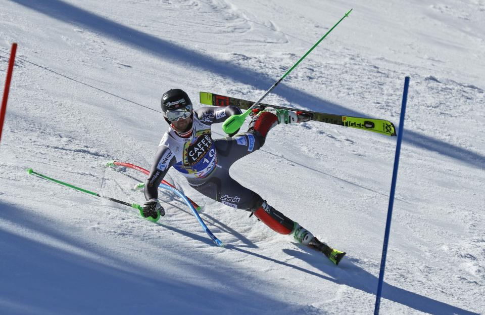Norway's Sebastian Foss Solevaag loses his balance during the first run of a men's alpine ski slalom, in Soldeu, Andorra, Sunday, March 17, 2019. (AP Photo/Gabriele Facciotti)
