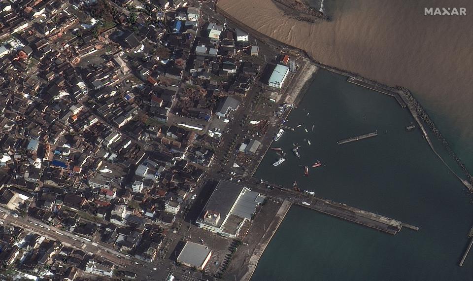 Capsized boats and damaged buildings in Suzu City after a powerful earthquake hit Japan.