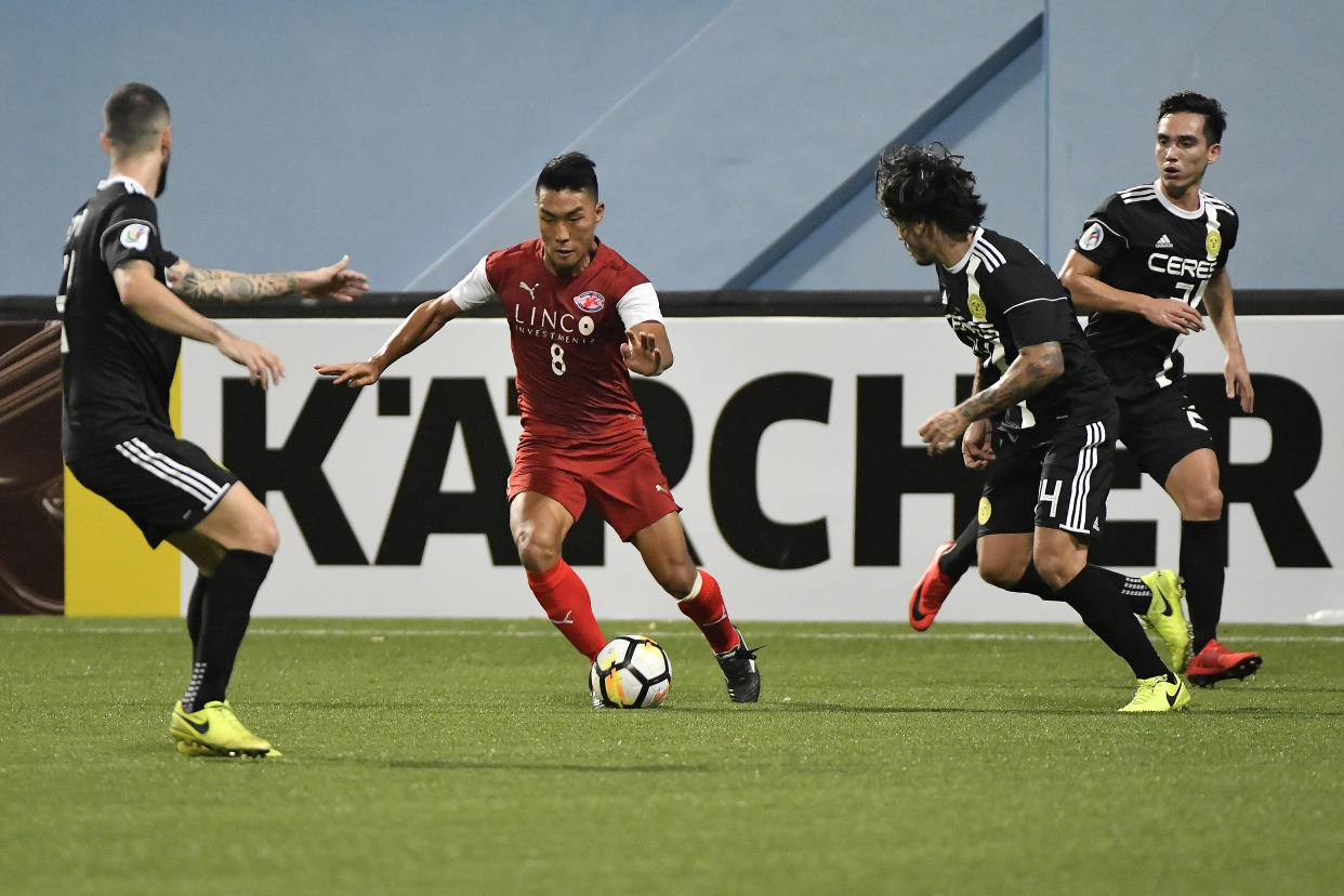 Song Ui-young (red jersey) in action for Home United in an AFC Cup match in 2018.