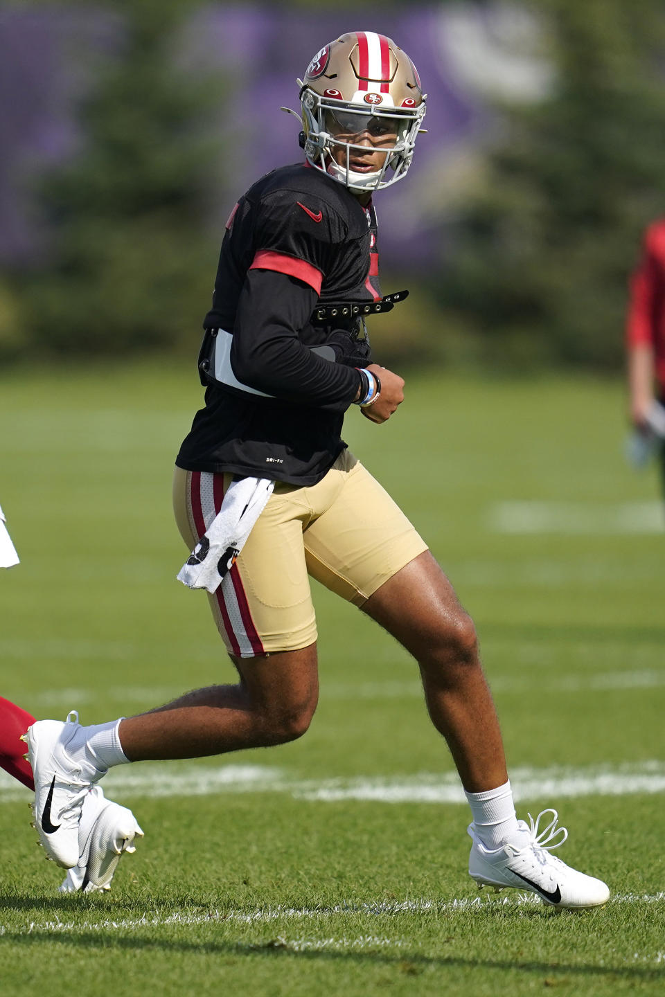 San Francisco 49ers quarterback Trey Lance takes part in joint drills with the Minnesota Vikings at the NFL football training camp in Eagan, Minn., Thursday, Aug. 18, 2022. (AP Photo/Abbie Parr)