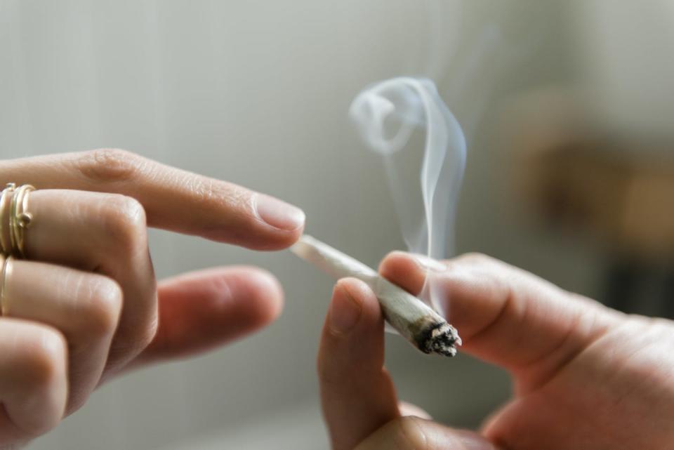 Public perceptions of the safety of cannabis determine how it is used and regulated. <a href="https://www.gettyimages.com/detail/photo/hands-of-man-and-woman-passing-marijuana-joint-royalty-free-image/1087610046" rel="nofollow noopener" target="_blank" data-ylk="slk:Jamie Grill/Tetra images via Getty Images;elm:context_link;itc:0" class="link ">Jamie Grill/Tetra images via Getty Images</a>