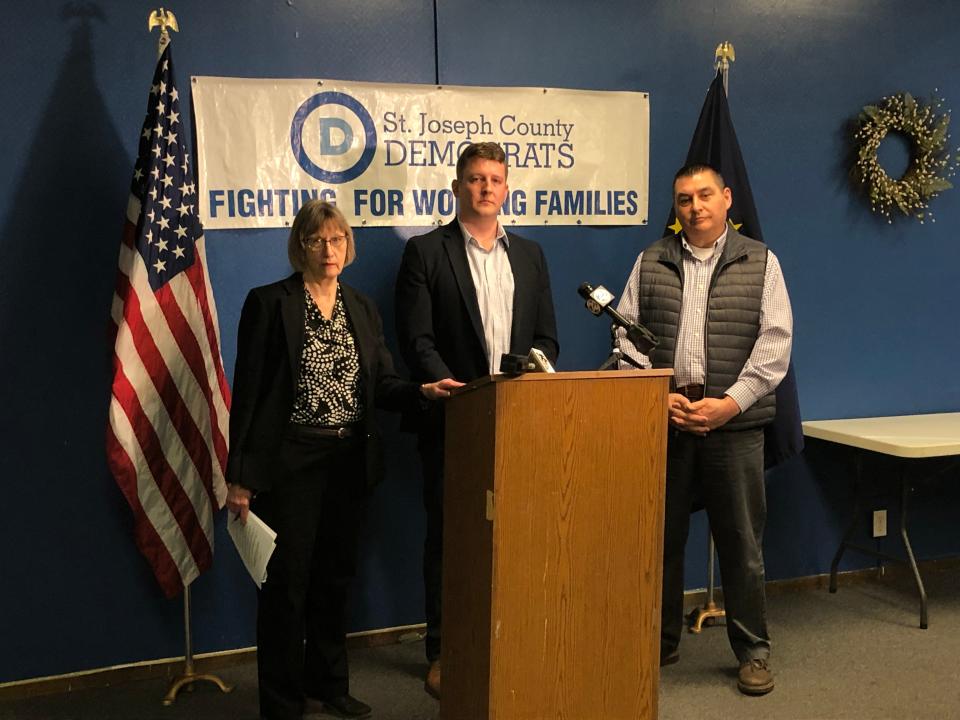 St. Joseph County Council Democrats, from left, Diana Hess, Bryan Tanner and Mark Catanzarite speak at a press conference on Feb. 14, 2023, at the county Democratic headquarters in South Bend.