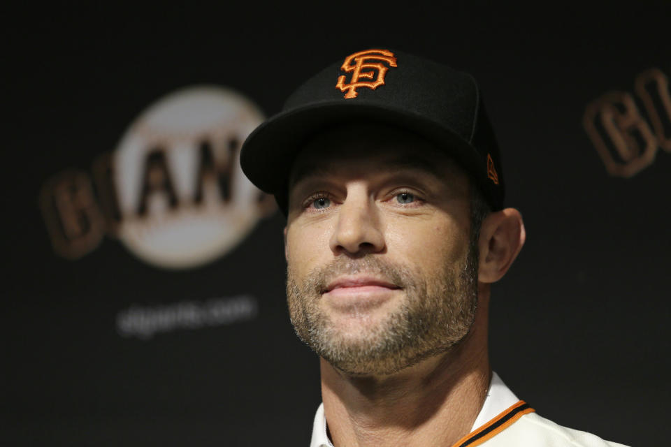 San Francisco Giants manager Gabe Kapler smiles after being introduced during a news conference at Oracle Park Wednesday, Nov. 13, 2019, in San Francisco. Gabe Kapler has been hired as manager of the San Francisco Giants, a month after being fired from the same job by the Philadelphia Phillies. Kapler replaces Bruce Bochy, who retired at the end of the season following 13 years and three championships with San Francisco. (AP Photo/Eric Risberg)