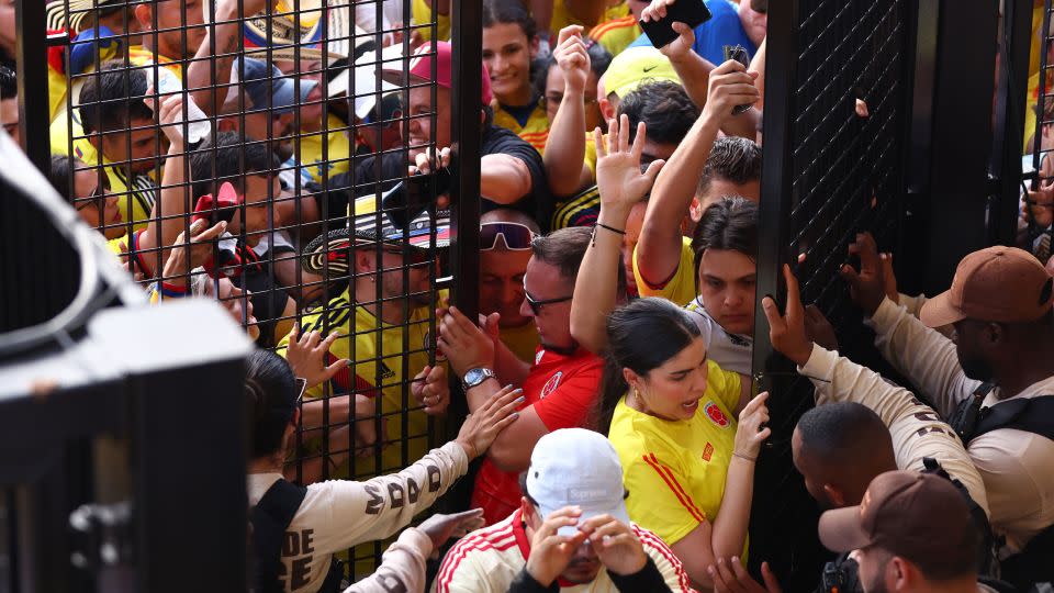 Fans try to enter the Copa América 2024 final between Argentina and Colombia at Hard Rock Stadium on July 14, 2024 in Miami Gardens, Florida. - Maddie Meyer/Getty Images