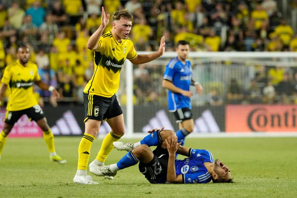 Apr 27, 2024; Columbus, Ohio, USA; Columbus Crew midfielder Aidan Morris (8) reacts to a foul on CF Montreal midfielder Mathieu Choiniere (29) during the second half of the MLS match at Lower.com Field. The teams played to a 0-0 draw.