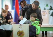 A man votes during an early parliamentary election in Yerevan, Armenia December 9, 2018. REUTERS/Vahram Baghdasaryan/Photolure