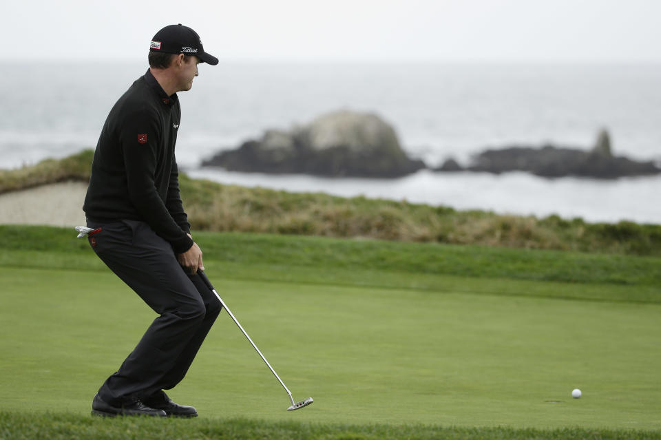 Jimmy Walker reacts after missing a birdie putt on the fourth green during the final round of the AT&T Pebble Beach Pro-Am golf tournament, Sunday, Feb. 9, 2014, in Pebble Beach, Calif. (AP Photo/Eric Risberg)