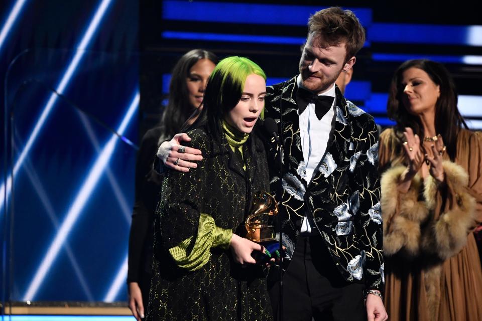 Billie Eilish accepts the song of the year Grammy for "Bad Guy" with her brother Finneas O'Connell.