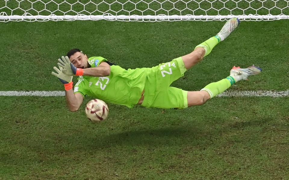 Villa goalkeeper Emiliano Martinez saved from Kingsley Coman in the shootout - AFP/JEWEL SAMAD