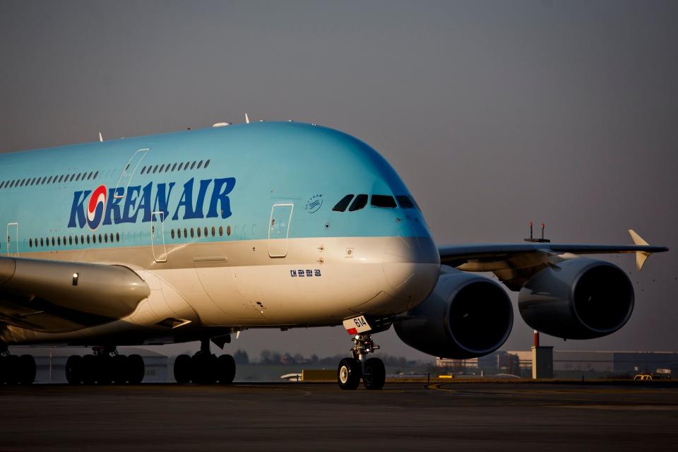 A Korean Air plane on the tarmac.