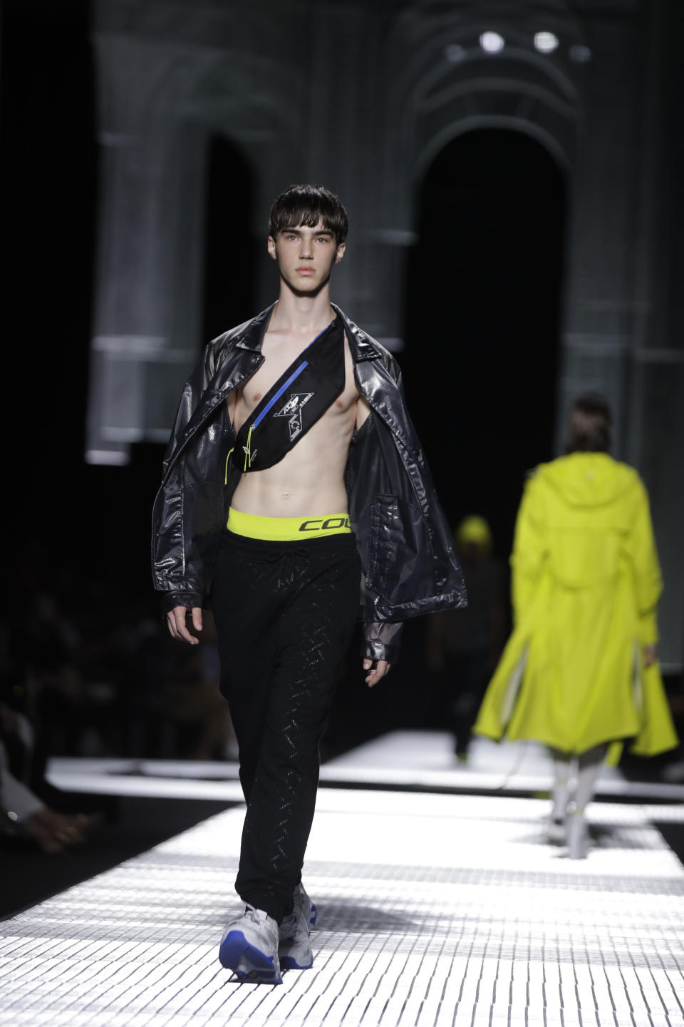 A model wears a creation as part of the Marcelo Burlon men's Spring-Summer 2020 collection, unveiled during the fashion week, in Milan, Italy, Saturday, June 15, 2019. (AP Photo/Luca Bruno)