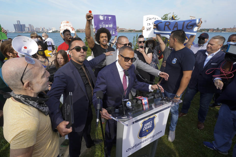 James Craig, a former Detroit Police Chief, announces he is a Republican candidate for Governor of Michigan amongst protesters on Belle Isle in Detroit, Tuesday, Sept. 14, 2021. (AP Photo/Paul Sancya)