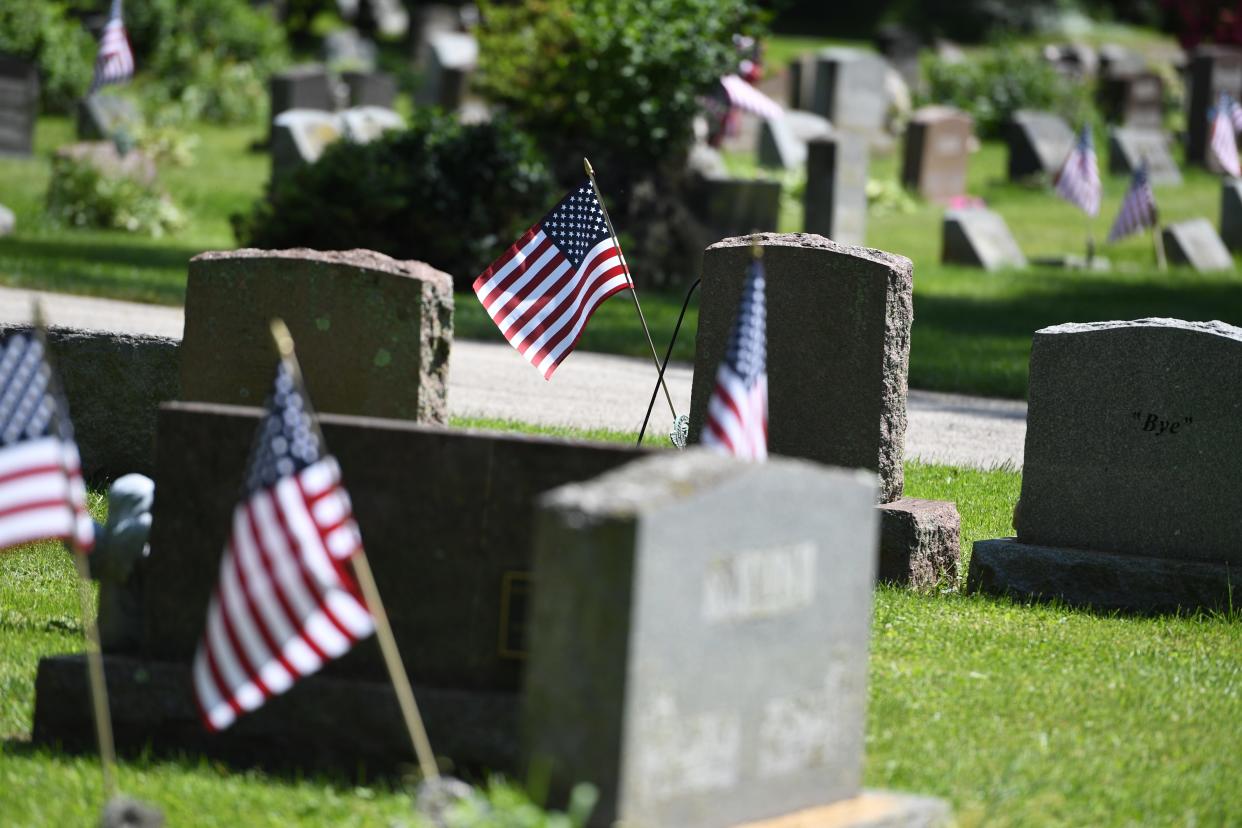 Flags placed by the Kent American Legion Post 496 on Thursday, May 23, 2024, mark the graves of veterans at Standing Rock Cemetery in preparation in time for Memorial Day.