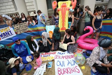Protesters demonstrate against France's ban of the burkini, outside the French Embassy in London, Britain August 25, 2016. REUTERS/Neil Hall