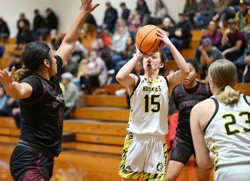 Hughson’s Peyton Avila attempts a jump shot during the Trans Valley League game with Riverbank at Hughson High School in Hughson, Calif., Thursday, Feb. 1, 2024.