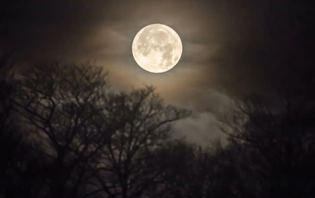 The moon over Huddersfield in Yorkshire on a frosty morning (Danny Lawson/PA)