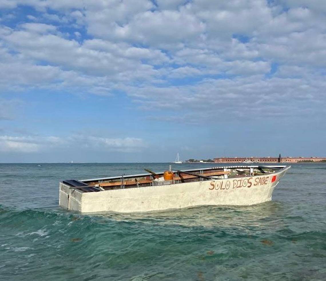 A boat with lettering reading “Solo Dios Sabe” (Only God Knows) was one of two boats that may have carried a group of 48 Cuban migrants to shore at the Dry Tortugas National Park Saturday morning.