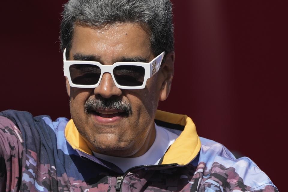 El presidente de Venezuela, Nicolás Maduro, durante un acto de campaña en el vecindario de Petare, en Caracas, Venezuela, el 18 de julio de 2024. (AP Foto/Ariana Cubillos)