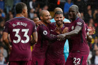 <p>Manchester City’s Sergio Aguero celebrates scoring their second goal with team mates Action Images via Reuters/John Sibley </p>