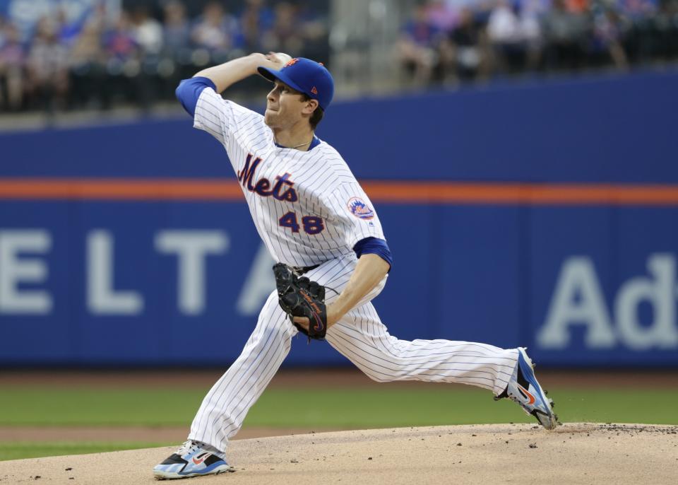 New York Mets pitcher Jacob deGrom will skip his next scheduled start on Monday after hyperextending his throwing elbow. (AP Photo)