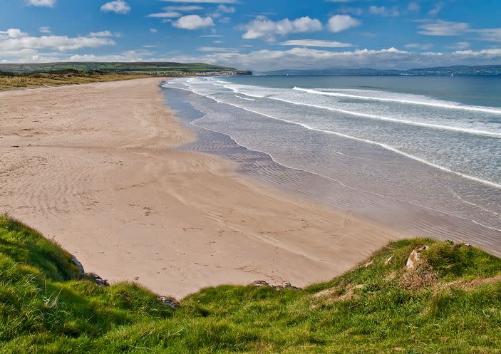 <p>In between the mouth of the River Bann and Portstewart are rolling dunes and pristine sands. And designated drivers rejoice: the two-mile stretch is one of the last places in Ireland where cars are still allowed to drive straight onto the beach. It may not be everyone’s cup of tea, but it’s incredibly popular with families who want to picnic on the shores.</p><p><a class="link " href="https://www.nationaltrust.org.uk/portstewart-strand" rel="nofollow noopener" target="_blank" data-ylk="slk:MORE INFO;elm:context_link;itc:0;sec:content-canvas">MORE INFO</a></p><p><strong>Where to stay: </strong>Situated on the stunning coast of North Antrim in the seaside town of Portstewart, <a href="https://www.booking.com/hotel/gb/me-amp-mrs-jones.en-gb.html?aid=2070935&label=sandy-beaches" rel="nofollow noopener" target="_blank" data-ylk="slk:Me & Mrs Jones Hotel;elm:context_link;itc:0;sec:content-canvas" class="link ">Me & Mrs Jones Hotel</a> offers a boutique restaurant & bar serving highly renowned dishes & drinks for all tastes.</p><p><a class="link " href="https://www.booking.com/hotel/gb/me-amp-mrs-jones.en-gb.html?aid=2070935&label=sandy-beaches" rel="nofollow noopener" target="_blank" data-ylk="slk:CHECK PRICES;elm:context_link;itc:0;sec:content-canvas">CHECK PRICES</a></p><p><strong>We want to help you stay inspired. <a href="https://hearst.emsecure.net/optiext/optiextension.dll?ID=7YU7qVoYVtfwDQ9FRmu13FlJO1voc2zWFpXEkCOg3fHM93yYTOZhzXhAkCYFJ0k4z8Lej9Pfnfdp7K" rel="nofollow noopener" target="_blank" data-ylk="slk:Sign up;elm:context_link;itc:0;sec:content-canvas" class="link ">Sign up</a> for the latest travel tales and to hear about our financially protected escapes and bucket list adventures.</strong></p><p><a class="link " href="https://hearst.emsecure.net/optiext/optiextension.dll?ID=7YU7qVoYVtfwDQ9FRmu13FlJO1voc2zWFpXEkCOg3fHM93yYTOZhzXhAkCYFJ0k4z8Lej9Pfnfdp7K" rel="nofollow noopener" target="_blank" data-ylk="slk:SIGN UP;elm:context_link;itc:0;sec:content-canvas">SIGN UP</a></p>