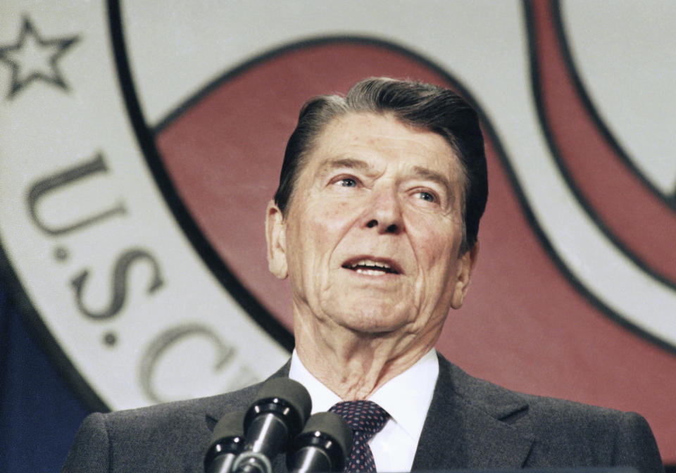 FILE - President Ronald Reagan addresses the U.S. Chamber of Commerce in Washington, April 24, 1986. The last extensive package came under President Ronald Reagan in 1986, and President George H.W. Bush signed a more limited effort four years later. (AP Photo/Barry Thumma, File)