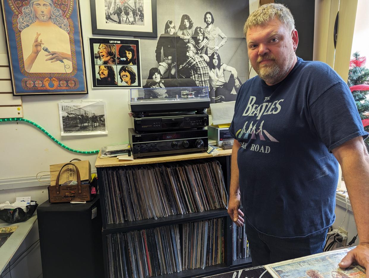 Roger Wieczorek, owner of Hat Trick Records, has been a lifelong fan of vinyl records, not just selling at his store but amassing a personal collection.