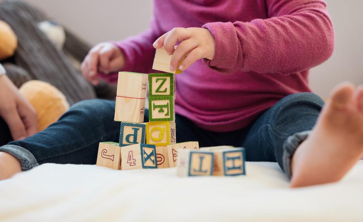 Critics are warning that, without additional federal funding, Ottawa's plan to create 250,000 new child-care spaces at an average cost of $10 per day by the end of March 2026 may not be feasible. (Getty Images - image credit)