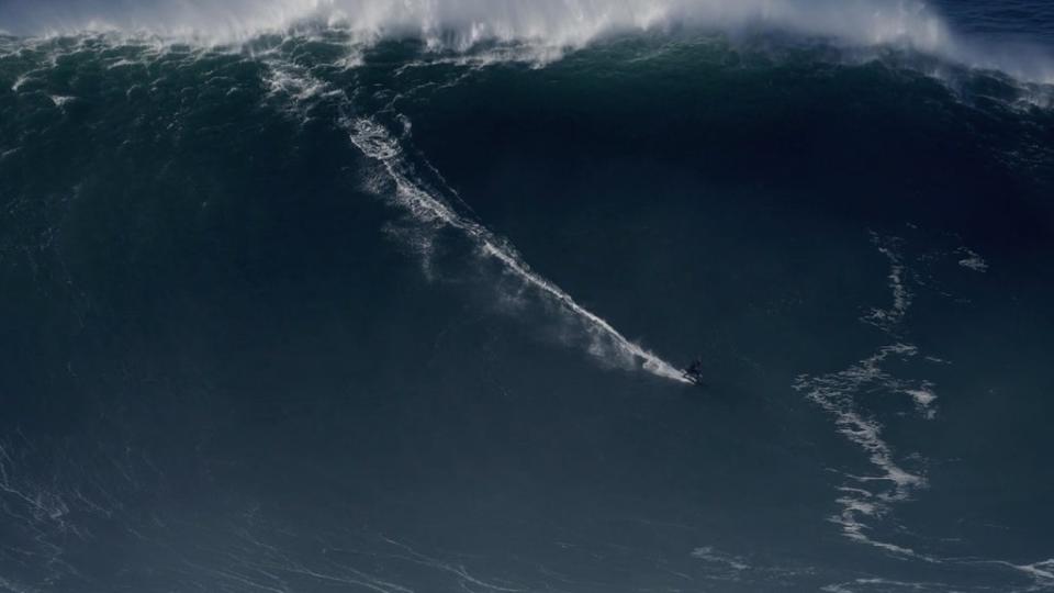 Sebastian Steudtner reached a height of 86 feet while riding waves in Portugal (WORLD SURF LEAGUE/AFP via Getty)