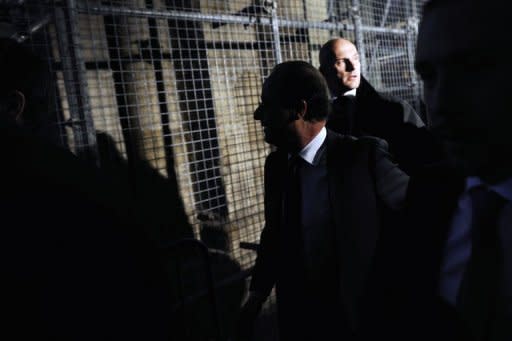 Francois Hollande arrives to give a speech after winning the second round of the presidential election in Tulle, southwestern France. France's new president-elect won a quick early victory Sunday when other European leaders fell in behind his plan to build a new common growth strategy as soon as his rival's defeat was confirmed